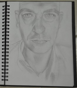 Self portrait in my 6 x 9 Sketchbook